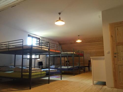 Poschodová posteľ alebo postele v izbe v ubytovaní Vila Mangart