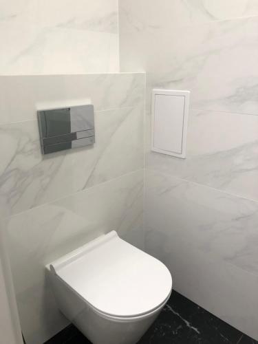 Koupelna v ubytování Apartament Komfortowy z klimatyzacja Plazowa 6