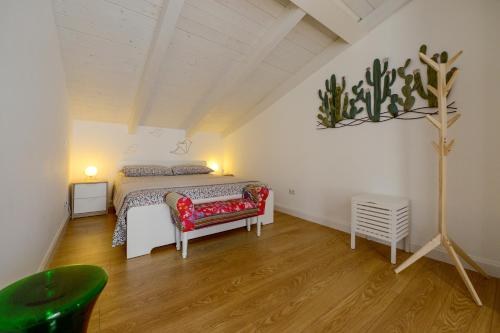 A bed or beds in a room at Casetta Gattini