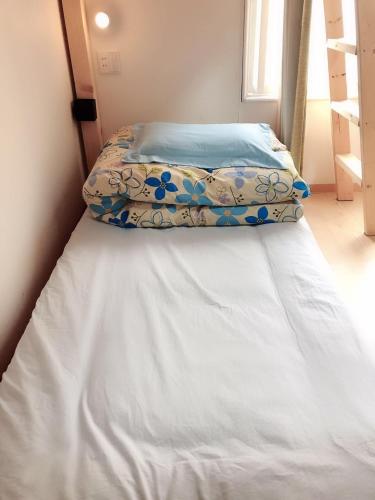 Postel nebo postele na pokoji v ubytování Guest House Ringo