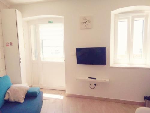TV a/nebo společenská místnost v ubytování Home away from home
