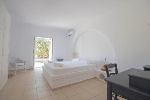 Postel nebo postele na pokoji v ubytování Villa Phoebe