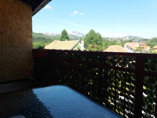 a balcony with a view of the mountains at Apartments Mirković in Cetinje