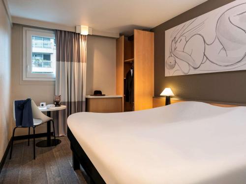 En eller flere senger på et rom på ibis Paris Alesia Montparnasse