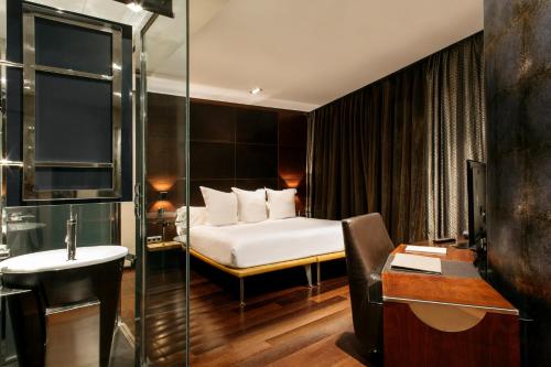 Katil atau katil-katil dalam bilik di Hotel Urban, a Small Luxury Hotel of the World