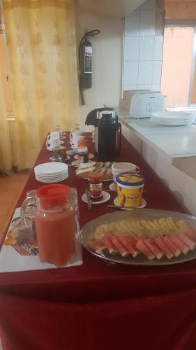 a table with food on it in a kitchen at Kilimanjaro Star Hotel in Moshi
