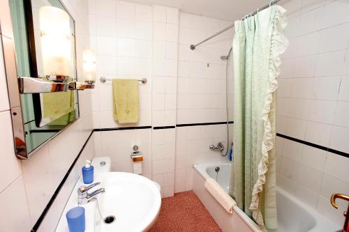 Kúpeľňa v ubytovaní Apartamentos Super