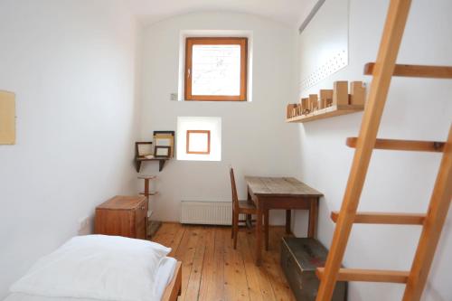 Postel nebo postele na pokoji v ubytování Hostel Celica