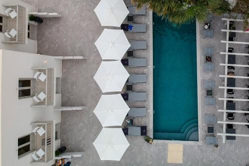 an overhead view of a living room with a green couch at Angels Pillow Luxury Boutique Residence - Adults Only in Naousa