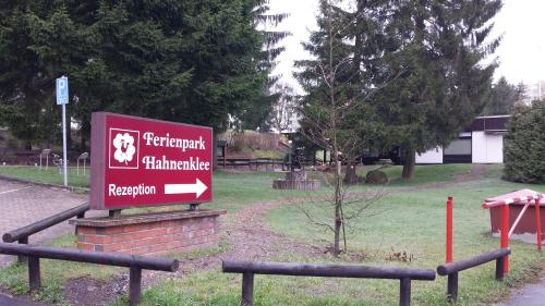 a sign for a park with a sign for at Modern & schöner Ausblick in Hahnenklee-Bockswiese