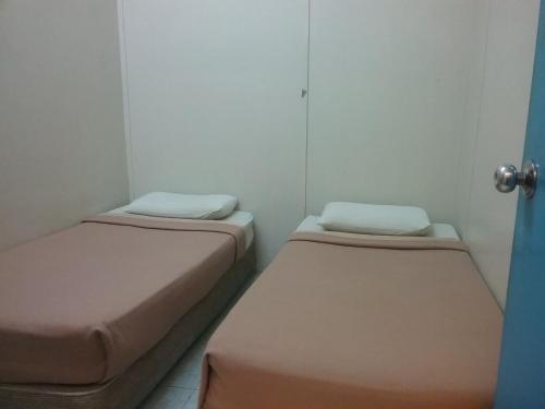 Katil atau katil-katil dalam bilik di ALORA BUDGET Inn
