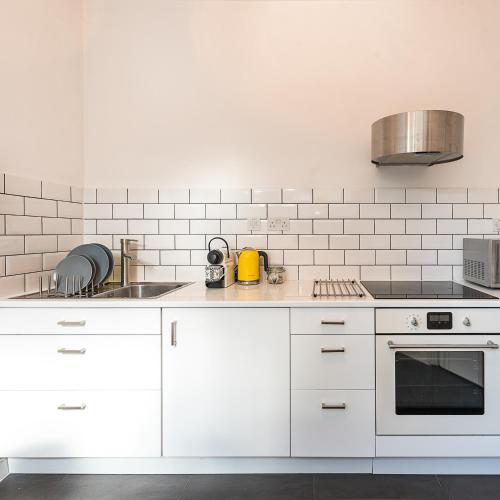 Una cocina o cocineta en Boutique Accommodation