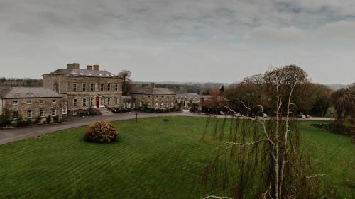 an aerial view of a large house with a large yard at Bellinter House Hotel & Spa in Navan