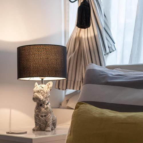 Una cama o camas en una habitación de Boutique Accommodation