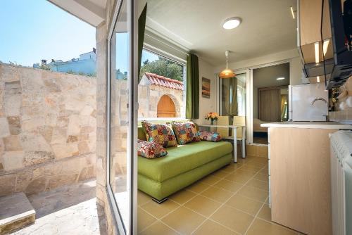 Η κουζίνα ή μικρή κουζίνα στο Boka Apartments