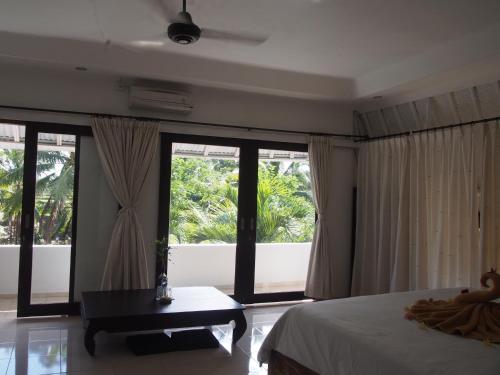 Cama o camas de una habitación en Junjungan Suite