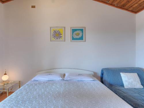Postel nebo postele na pokoji v ubytování Apartment Mariza-2 by Interhome