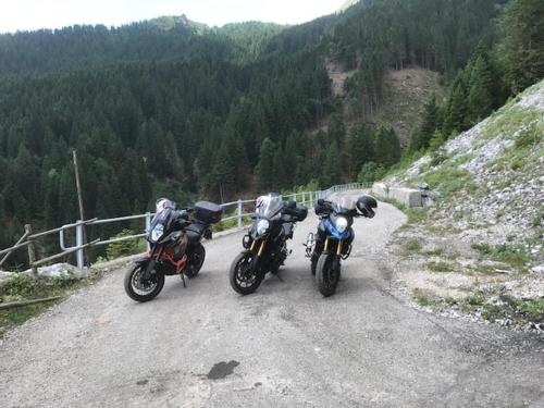two motorcycles parked on a road on a mountain at Gästehaus Steinerhof in Nikolsdorf