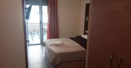 Posteľ alebo postele v izbe v ubytovaní Villa Georgia beach