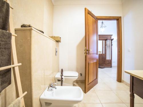 a bathroom with a sink and a toilet in it at Holiday Home Son Trobat by Interhome in Mancor del Valle