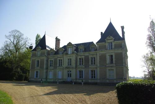 a large house with turrets on top of it at Le Rossay in Saint-Clément-de-la-Place