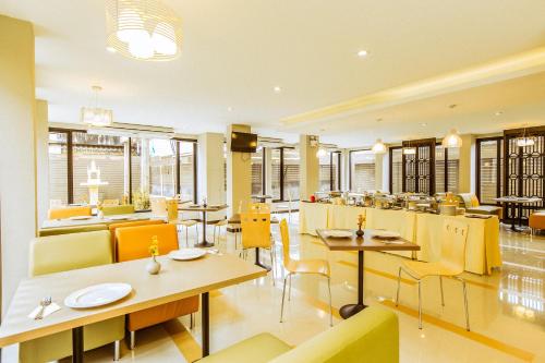 Un lugar para sentarse en De Hug Hotel & Residence