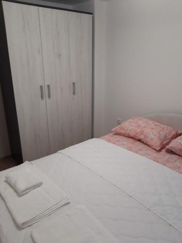 Postel nebo postele na pokoji v ubytování Apartman Miloš