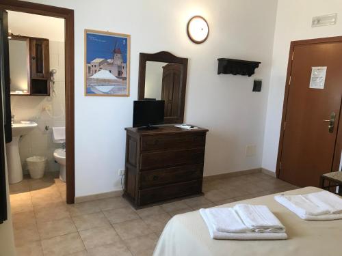Koupelna v ubytování Baglio Pocoroba