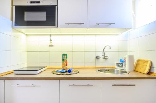 Kuchyňa alebo kuchynka v ubytovaní La Maison du Calme