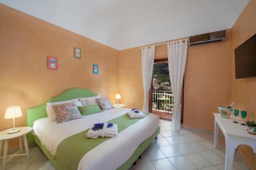 A bed or beds in a room at Villa Eos