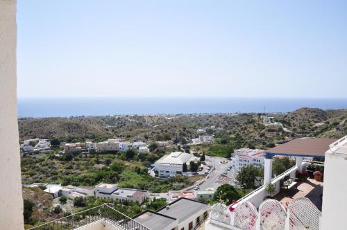 an aerial view of a city with a road at Boutique Hotel Mamabels in Mojácar