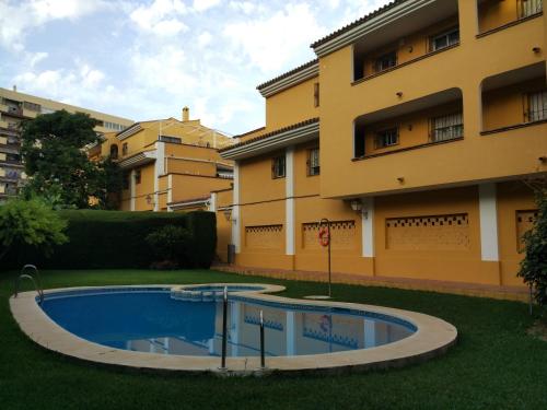 Bazén v ubytovaní Precioso Apartamento Frente Al Mar alebo v jeho blízkosti
