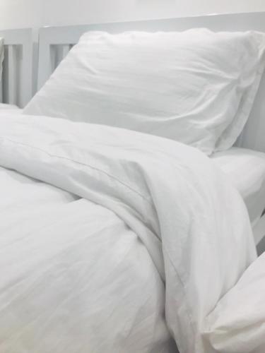 Zleepinezz Hostelにあるベッド