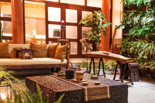 Dali Yanyuan Mountain Retreatにあるシーティングエリア