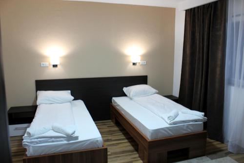 Postel nebo postele na pokoji v ubytování Hotel Casablanca