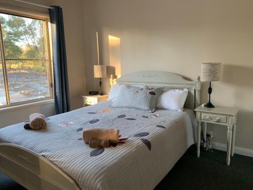 A bed or beds in a room at Bryn Glas Farm Stay
