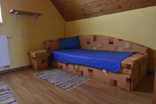 Un pat sau paturi într-o cameră la Maralandia Trenčan