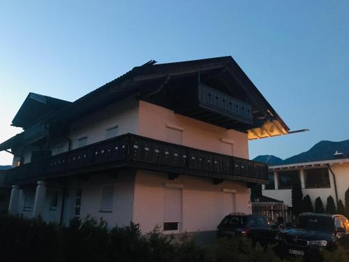 a building with a balcony on the side of it at Ferienhaus Butterfly in Garmisch-Partenkirchen