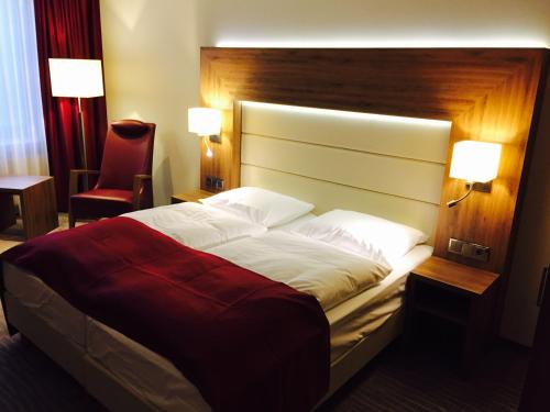 
Ein Bett oder Betten in einem Zimmer der Unterkunft Best Western City Hotel Braunschweig
