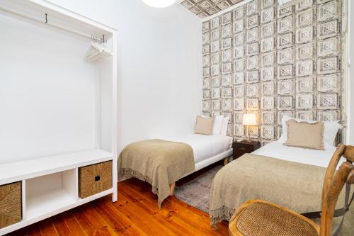 Ein Bett oder Betten in einem Zimmer der Unterkunft 4 Bedroom Apartment on the City Center