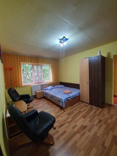 Ένα ή περισσότερα κρεβάτια σε δωμάτιο στο Apartament Maya