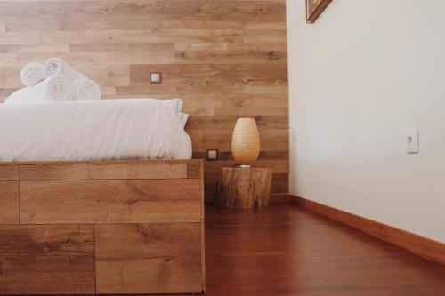 Ένα ή περισσότερα κρεβάτια σε δωμάτιο στο Oportocean Suites
