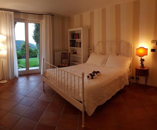 เตียงในห้องที่ Villa Claudia