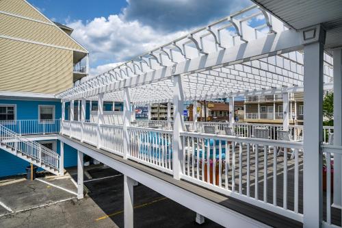 a white railing on the side of a building at Madison Beach Motel in Ocean City