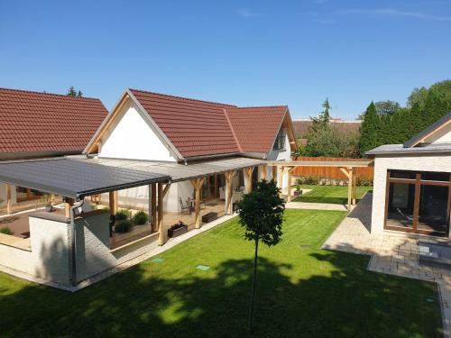 an aerial view of a house with a roof at Villa Quality Wellness in Dozmat