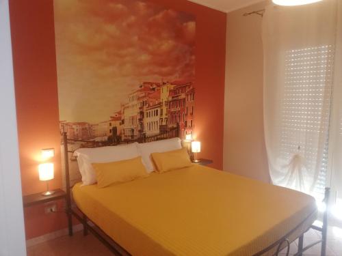Кровать или кровати в номере B&B Around the World