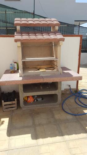 a pizza oven sitting on top of a table at Appartamenti Borgo Panoramico n.1 in Tropea
