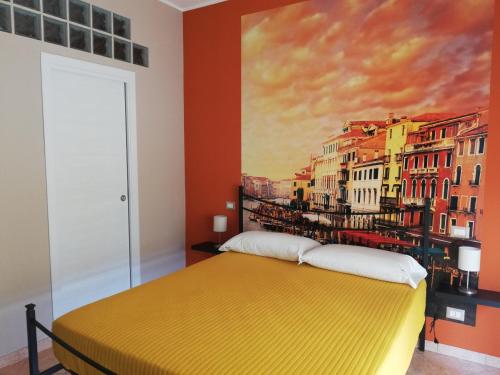 Кровать или кровати в номере B&B Around the World