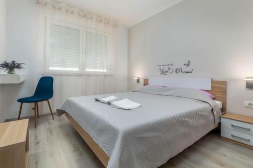 Postel nebo postele na pokoji v ubytování Apartment Sole