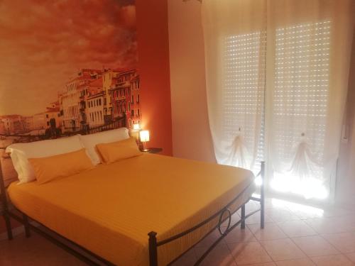 Кровать или кровати в номере B&B Around the World